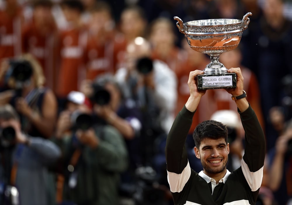 Alcaraz REINA em Roland Garros: Vitória Explosiva na Batalha Épica contra Sinner!